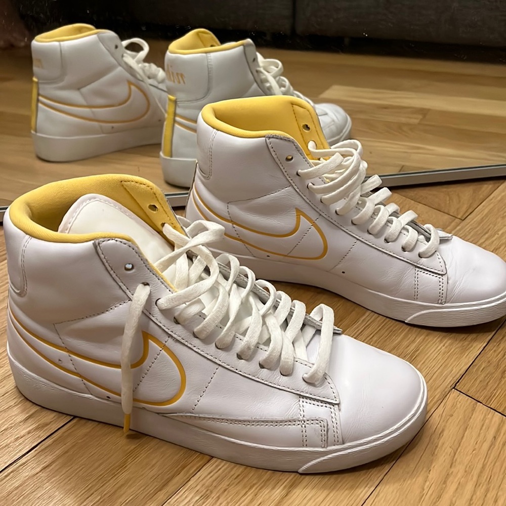 Nike high tops with yellow detail. Worn twice - like new
